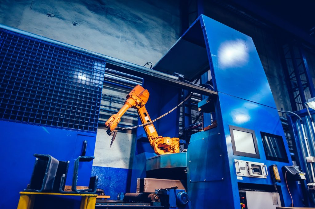 Robotic arm operating in a modern factory